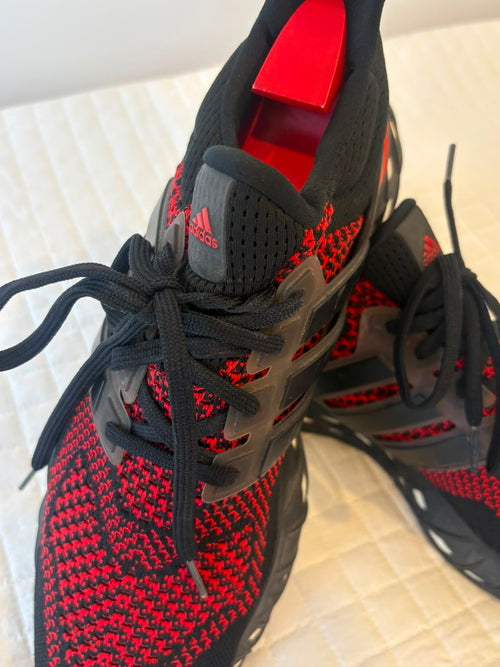 Adidas UltraBoost Web DNA in the Black Vivid Red Colorway